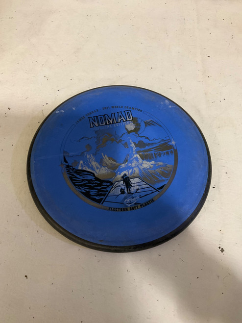 Vist Large View of Product Image Which is Used MVP NOMAD Disc Golf Putter Royal Blue