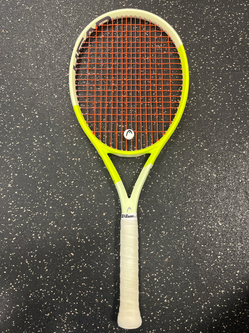 Vist Large View of Product Image Which is Used Head EXTREME MP Adult Tennis Racquet Yellow 4 3/8”