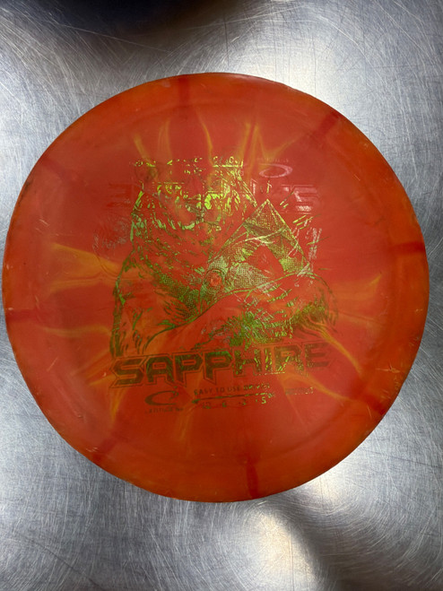 Vist Large View of Product Image Which is Used Latitude 64 RETRO SAPPHIRE Disc Golf Driver Orange