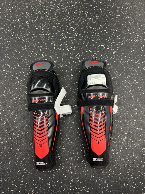 Vist Large View of Product Image Which is Used Bauer LIL SPORT Youth Shin Guards Black 10"
