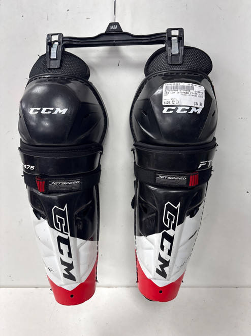 Vist Large View of Product Image Which is Used CCM JETSPEED FT475 Junior Shin Guards White 12"