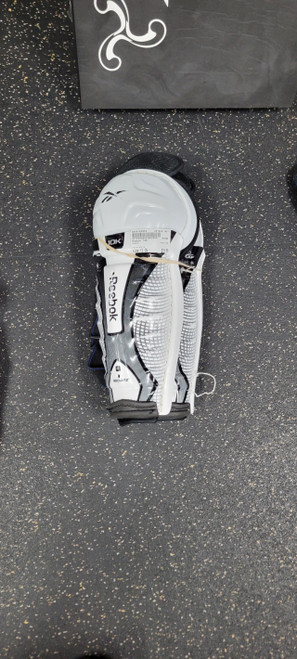 Vist Large View of Product Image Which is Used Reebok 10K Intermediate Shin Guards White 12"