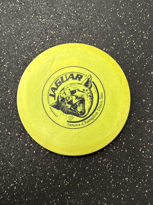 Vist Large View of Product Image Which is Used Innova JAGUAR CHAMPION Disc Golf Mid Range Yellow