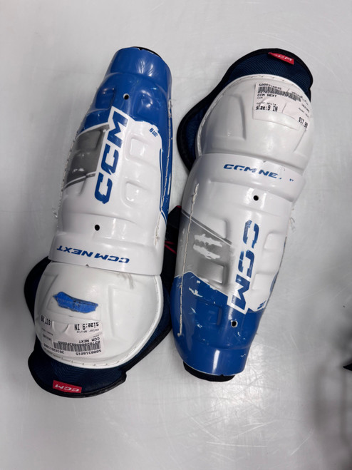 Vist Large View of Product Image Which is Used CCM NEXT Youth Shin Guards White 9"