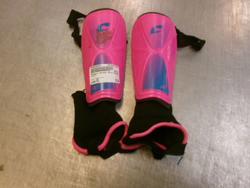 Vist Large View of Product Image Which is Used Champro Soccer Shin Guards Junior Neon Pink XS