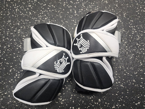 Vist Large View of Product Image Which is Used Brine KING Lacrosse Arm Pads/Guards Black And White SM