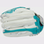 The finger backs of a 12.5-inch white/teal Rawlings Shut Out faspitch softball glove View 5
