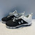 Used Under Armour BLACK AND WHITE CLEATS BB/SB Cleats Black Junior 02.5 11878-S000028579 View 1