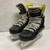 Used Bauer SUPREME M4 Intermediate Hockey Skate Black And Yellow Intermediate 5.5 11855-S000204699 View 1