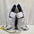 Used Bauer SUPREME S27 Goalie Leg Pads Junior White And Navy Blue Small 11651-S000417575 View 4
