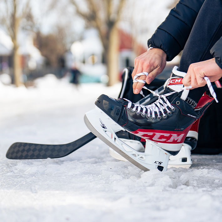 Hockey skates lacing up
