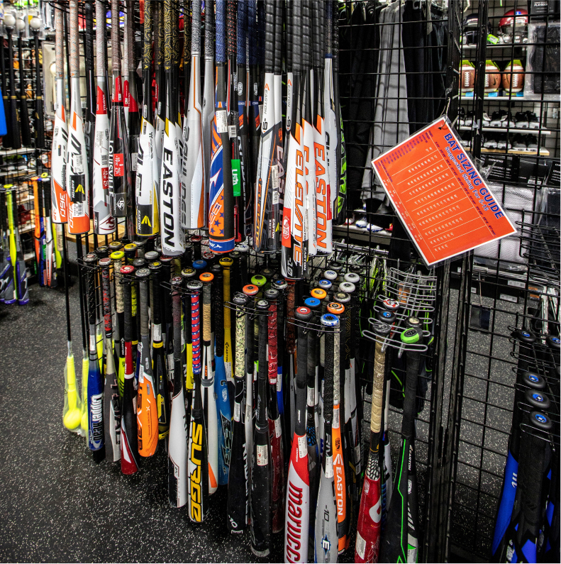 a store display with a bunch of baseball bats