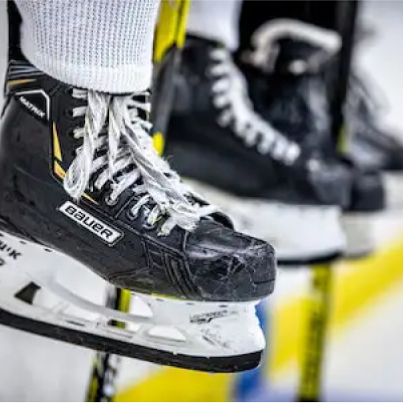 Hockey player wearing Baur Hockey Skates