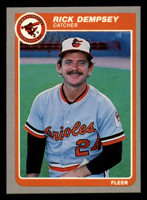 Baltimore Orioles catcher Rick Dempsey holds up the ball after