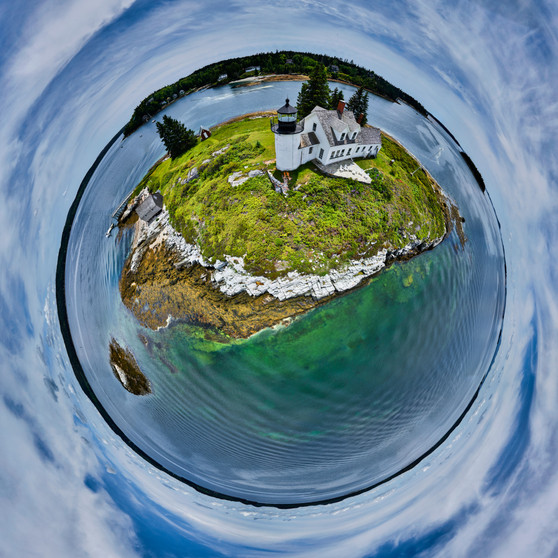 A 360-degree panoramic Spherescape depicting Pumpkin Island Lighthouse near Blue Hill, Maine, with lush island vegetation and clear surrounding waters, converging into a perfect circle against a wide sky