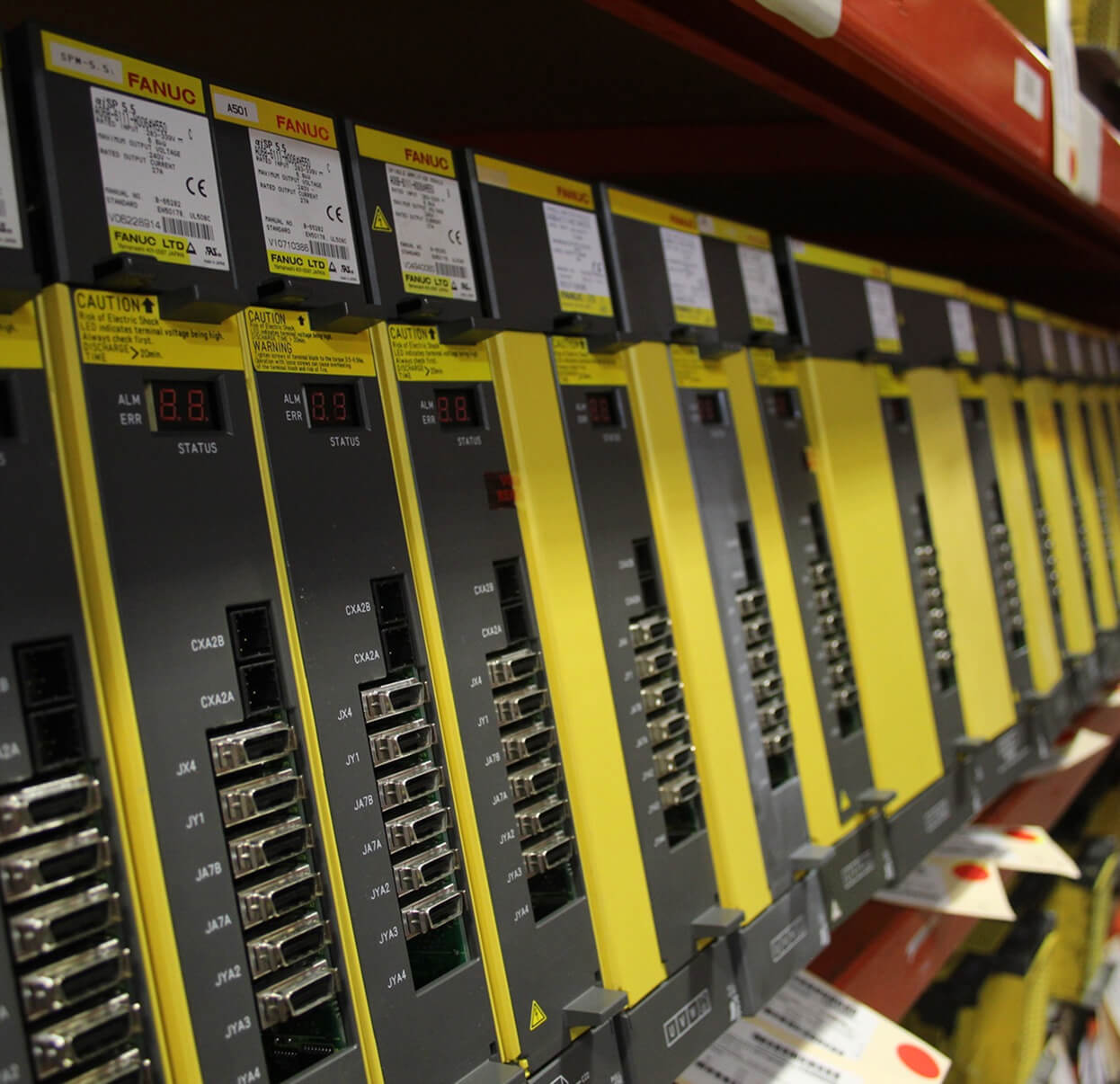 Row of Fanuc servo drives