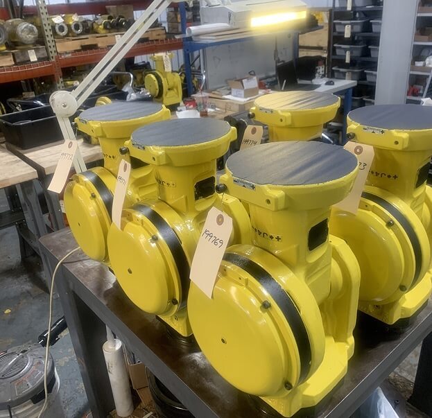 Repaired Fanuc robot parts with product tags