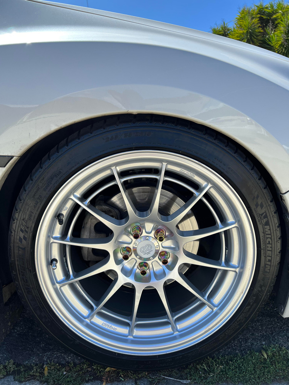 Enkei NT03+M 5x120 18x10+25 Silver Wheels | ThreePiece.us