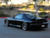 Black 1994 Mazda RX-7 with BBS RS-GT Silver Rims