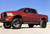 Orange Ram 1500 with AT154 Milled and Black Bomb Wheels