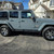 Grey Wrangler with Chrome American Truxx Armor Wheels