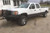 White GMC 3500 with Chrome American Truxx Armor Rims