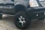 Black 2010 GMC Denali with American Truxx Ninja Wheels