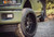 Green Ford F150 with Matte Black American Truxx Rims