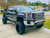 2018 GMC Sierra with American Truxx Spyder Black Rims