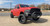 Red Ram 1500 with 24x14 American Truxx DNA Wheels