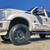 White F250 With American Truxx DNA Black Rims