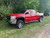 Red Silverado 2500HD with American Truxx Chrome Wheels