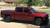 Red Silverado with Black Milled American Truxx Blade Wheels