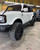 White Bronco with American Truxx Evolution Wheels