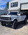 White Bronco with American Truxx Evolution Wheels