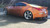 Orange Nissan 350Z with Anthracite American Racing Torq Thrust M Rims