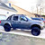 Nissan Frontier ProX with American Racing AR201 Cast Ir on Black Rims