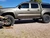 Toyota Tacoma with American Racing AR201 Matte Bronze Wheels
