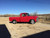 Red Ford F100 with American Racing VN309 Torq Thrust Original Wheels