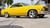 Yellow Chevy Nova with American Racing VN405 Torq Thrust II