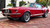 Red Mustang GT500 with American Racing Gunmetal Rims