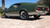 Green Mustang Mach 1 With Aftermarket Rims American Racing VN501