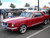 Red Ford Mustang with American Racing VN505 Torq Thrust II Wheels