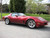 Red C3 Corvette with Polished American Racing VN505 Torq Thrust Wheels