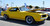 Yellow 1969 Chevy Camaro with American Racing VN215 Classic Torq Thrust II Wheels