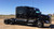 Black peterbilt with American Racing Black Milled ATX403 Roulette