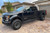 Lifted Black Ford F250 Tremor with Black Rhino Abrams Gunmetal Rims