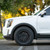 White Kia Telluride with Black Rhino Arches Rims