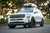 White Kia Telluride with Black Rhino Arches Rims