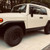 Tan Toyota FJ Cruiser 2012 with Black Rhino Aliso Black Rims